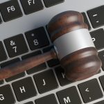 Cyber crime concept. Law gavel on computer keyboard, banner. Top view, 3d illustration